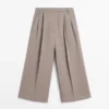 Bermudas largas y fluidas de pierna ancha Bermudas largas y fluidas de pierna ancha