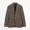 Blazer de lino con detalles en los bolsillos Blazer de lino con detalles en los bolsillos