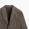 Blazer de lino con detalles en los bolsillos Blazer de lino con detalles en los bolsillos