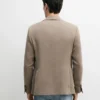 Blazer de lino de corte entallado con detalles en los bolsillos Blazer de lino de corte entallado con detalles en los bolsillos