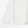 Blusa de cuello alto con detalle en el dobladillo Blusa de cuello alto con detalle en el dobladillo