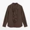 Blusa fluida con volantes Blusa fluida con volantes