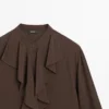 Blusa fluida con volantes Blusa fluida con volantes
