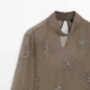 Blusa semitransparente bordada Blusa semitransparente bordada