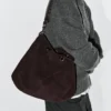 Bolso de piel de ante serraje con ojales Bolso de piel de ante serraje con ojales