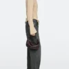 Bolso de piel napa con hebilla metálica Bolso de piel napa con hebilla metálica