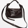 Bolso de piel napa con hebilla metálica Bolso de piel napa con hebilla metálica