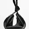 Bolso de piel napa con ojales Bolso de piel napa con ojales
