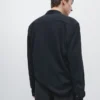 Camisa de corte regular en tejido melange Camisa de corte regular en tejido melange
