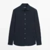 Camisa de corte regular en tejido melange Camisa de corte regular en tejido melange