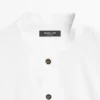 Camisa de cuello alto con botones dorados