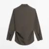 Camisa de doble botonadura de tejido fluido