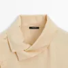 Camisas asimétricas con botones Camisas asimétricas con botones