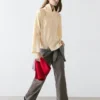 Camisas asimétricas con botones Camisas asimétricas con botones