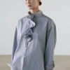 Camisas con detalle de cuello con volantes Camisas con detalle de cuello con volantes