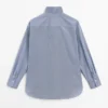 Camisas con detalle de cuello con volantes Camisas con detalle de cuello con volantes