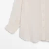 Camisas fluidas con detalle plisado Camisas fluidas con detalle plisado
