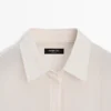 Camisas fluidas con detalle plisado Camisas fluidas con detalle plisado
