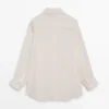 Camisas fluidas con detalle plisado Camisas fluidas con detalle plisado