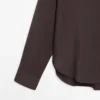 Camisas fluidas con detalles de botones Camisas fluidas con detalles de botones