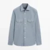Camisas vaqueras de corte regular con detalles de bolsillos Camisas vaqueras de corte regular con detalles de bolsillos