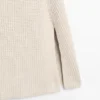Capa de punto con detalles de aberturas Capa de punto con detalles de aberturas