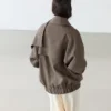 Chaqueta bomber de lino jaspeado con bufanda Chaqueta bomber de lino jaspeado con bufanda