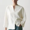 Chaqueta de lino con detalles de botones Chaqueta de lino con detalles de botones
