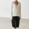 Falda midi de piel napa con detalle de encaje Falda midi de piel napa con detalle de encaje