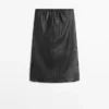 Falda midi de piel napa con detalle de encaje Falda midi de piel napa con detalle de encaje