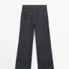 Jeans acampanados de cintura alta Jeans acampanados de cintura alta