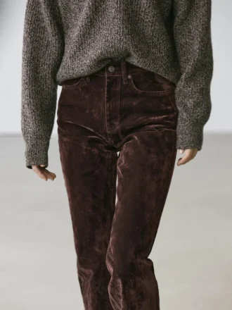 Jeans acampanados de talle alto con acabado flocado