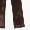 Jeans acampanados de talle alto con acabado flocado Jeans acampanados de talle alto con acabado flocado