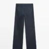 Jeans de talle alto con corte acampanado y bolsillos Jeans de talle alto con corte acampanado y bolsillos