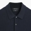 Jerséu de polo de punto de lana merino Jerséu de polo de punto de lana merino