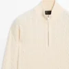 Jerséu de punto con cuello alto y cremallera Jerséu de punto con cuello alto y cremallera
