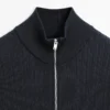 Jerséu de punto con cuello alto y cremallera Jerséu de punto con cuello alto y cremallera
