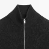 Jerséu de punto con cuello alto y cremallera Jerséu de punto con cuello alto y cremallera