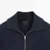Jerséu de punto de algodón con cuello alto y cremallera Jerséu de punto de algodón con cuello alto y cremallera