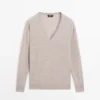 Jerséu de punto oversize con cuello en V