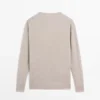 Jerséu de punto oversize con cuello en V