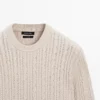 Jerséu de punto trenzado 100 % algodón con cuello redondo Jerséu de punto trenzado 100 % algodón con cuello redondo