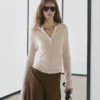 Jerséu Henley de mezcla de lana con calados Jerséu Henley de mezcla de lana con calados