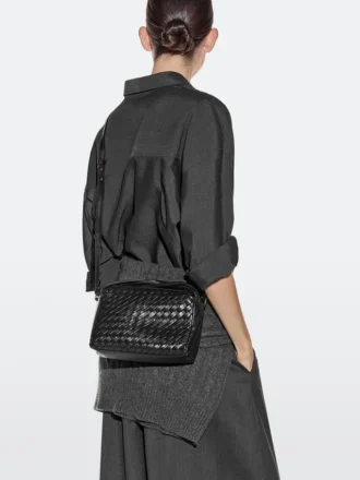 Mini bolso trenzado de piel napa