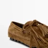 Mocasines de ante serraje con flecos y borlas Mocasines de ante serraje con flecos y borlas