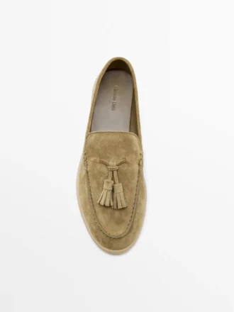 Mocasines de piel serrada con borlas