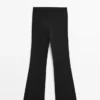 Pantalones acampanados con bolsillo Pantalones acampanados con bolsillo
