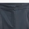 Pantalones acampanados encerados Pantalones acampanados encerados