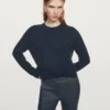 Pantalones acampanados encerados Pantalones acampanados encerados