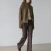 Pantalones acampanados encerados Pantalones acampanados encerados